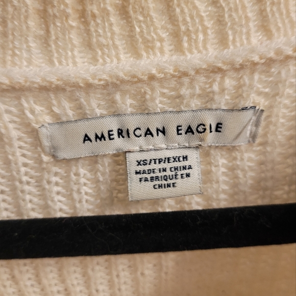 Cream-coloured sweater with multi-coloured stripes. - Picture 3 of 4